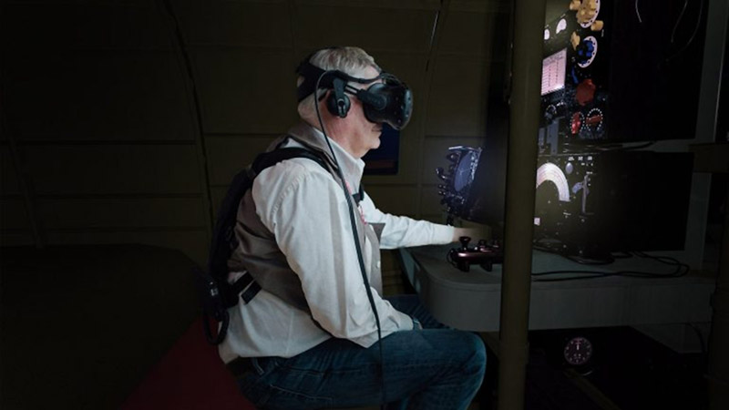 Sitting at the Lancaster’s wireless operator’s desk wearing a haptic vest and a virtual reality headset